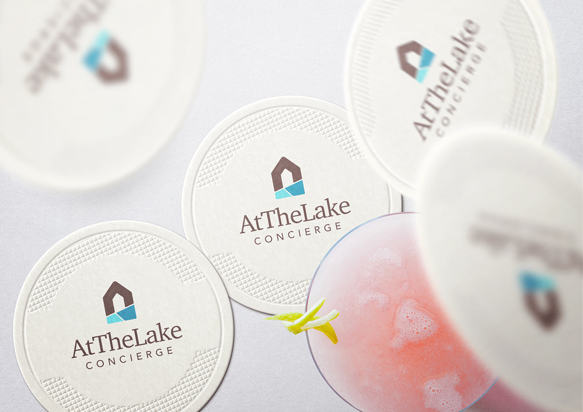At The Lake Concierge logo design printed on a coaster